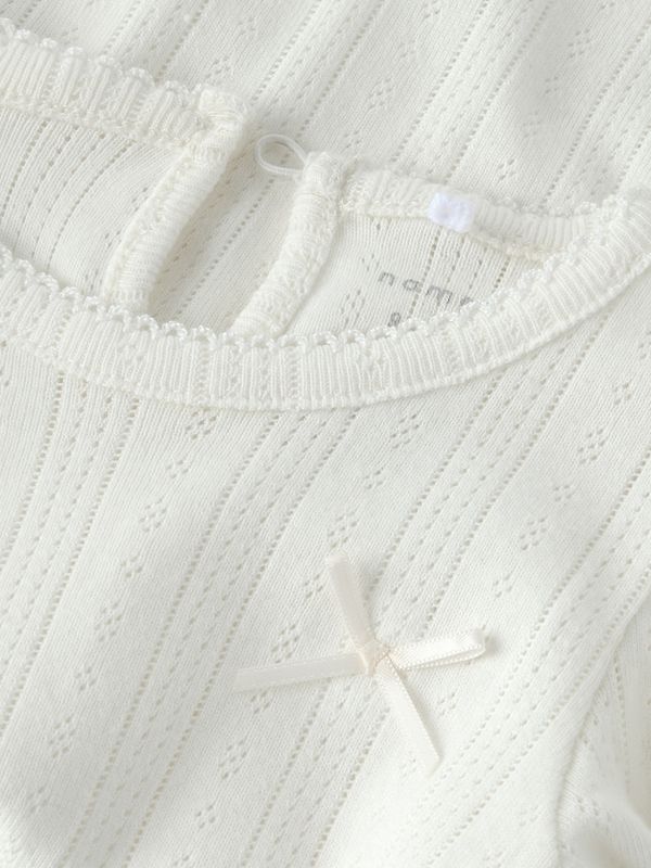 Nbfophelia offwhite body m/mønster i stoffet